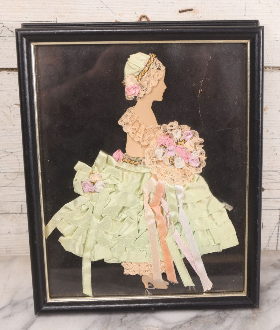 Lot 104 - Grouping Of Three Vintage Framed Ribbon Ladies, Including Woman In White Lace Dress With Real Hair In Oval Frame, Woman In Green And Woman In Pink, 8-3/4" x 10-3/4"