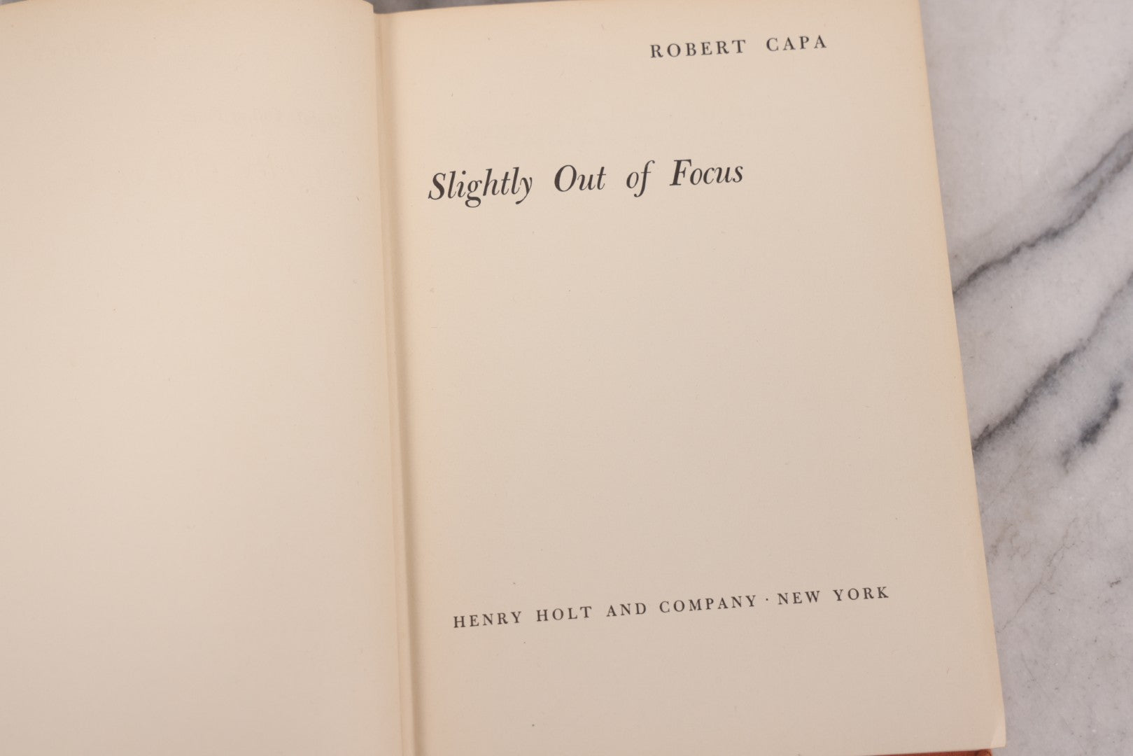 Lot 109 - "Slightly Out Of Focus" Vintage War Reporting And Photography Memoir Book By Robert Capa, Published By Henry Holt And Company, New York, 1947