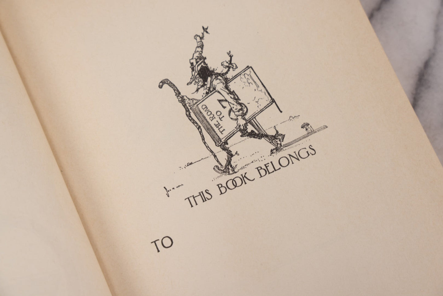 Lot 112 - "The Road To Oz" Antique Book By Frank L. Baum, Illustrated By John R. Neill, Ex-Library Copy, Published By The Reilly & Lee Co., Chicago, Copyright 1909