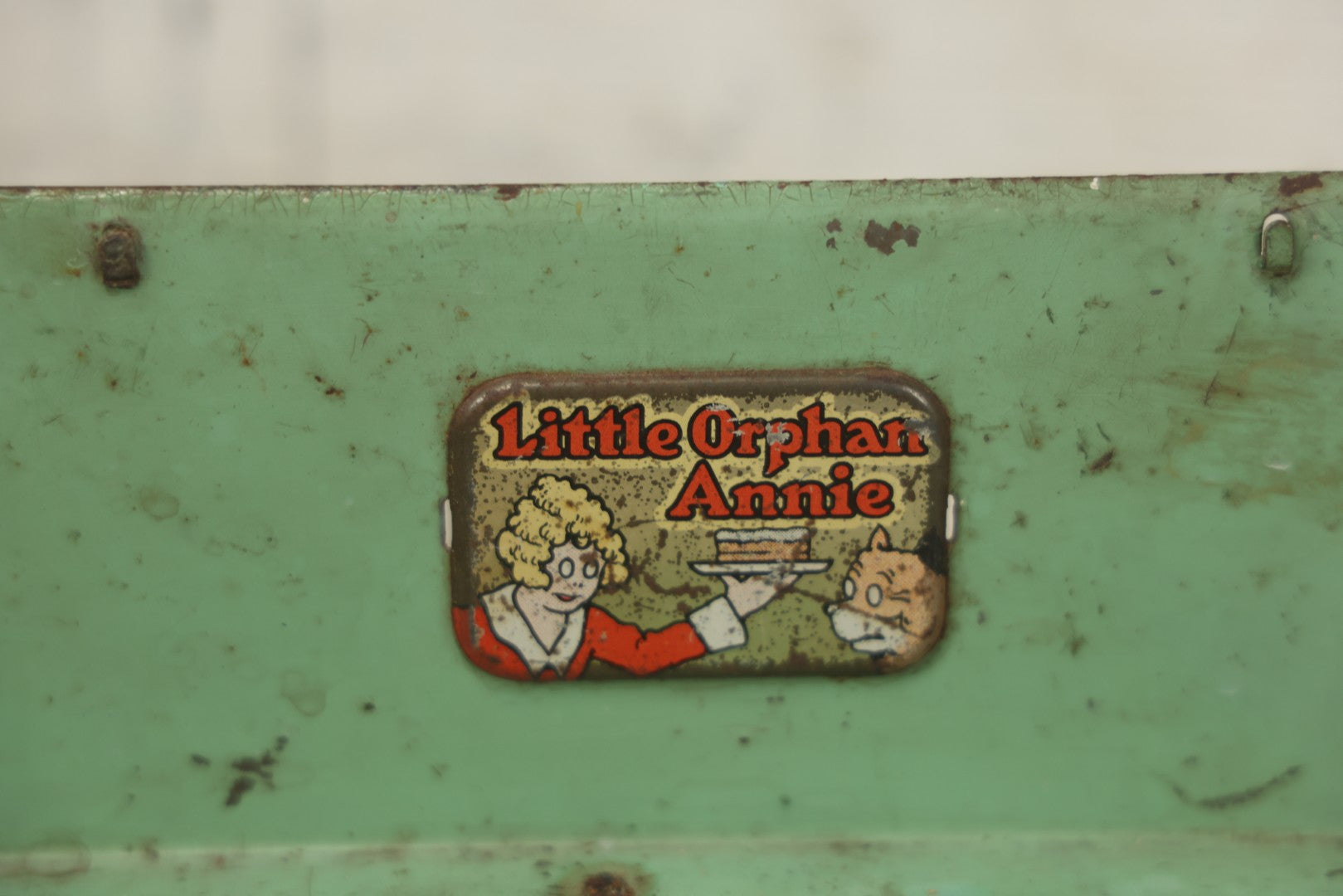 Lot 081 - Vintage Little Orphan Annie Tin Lithograph Toy Stove With Red And Green Paint, Circa 1930s Note Surface Wear And Rust