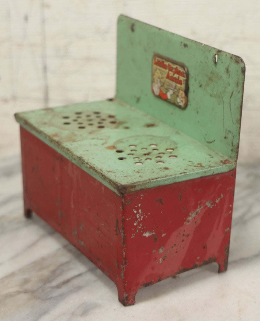 Lot 081 - Vintage Little Orphan Annie Tin Lithograph Toy Stove With Red And Green Paint, Circa 1930s Note Surface Wear And Rust
