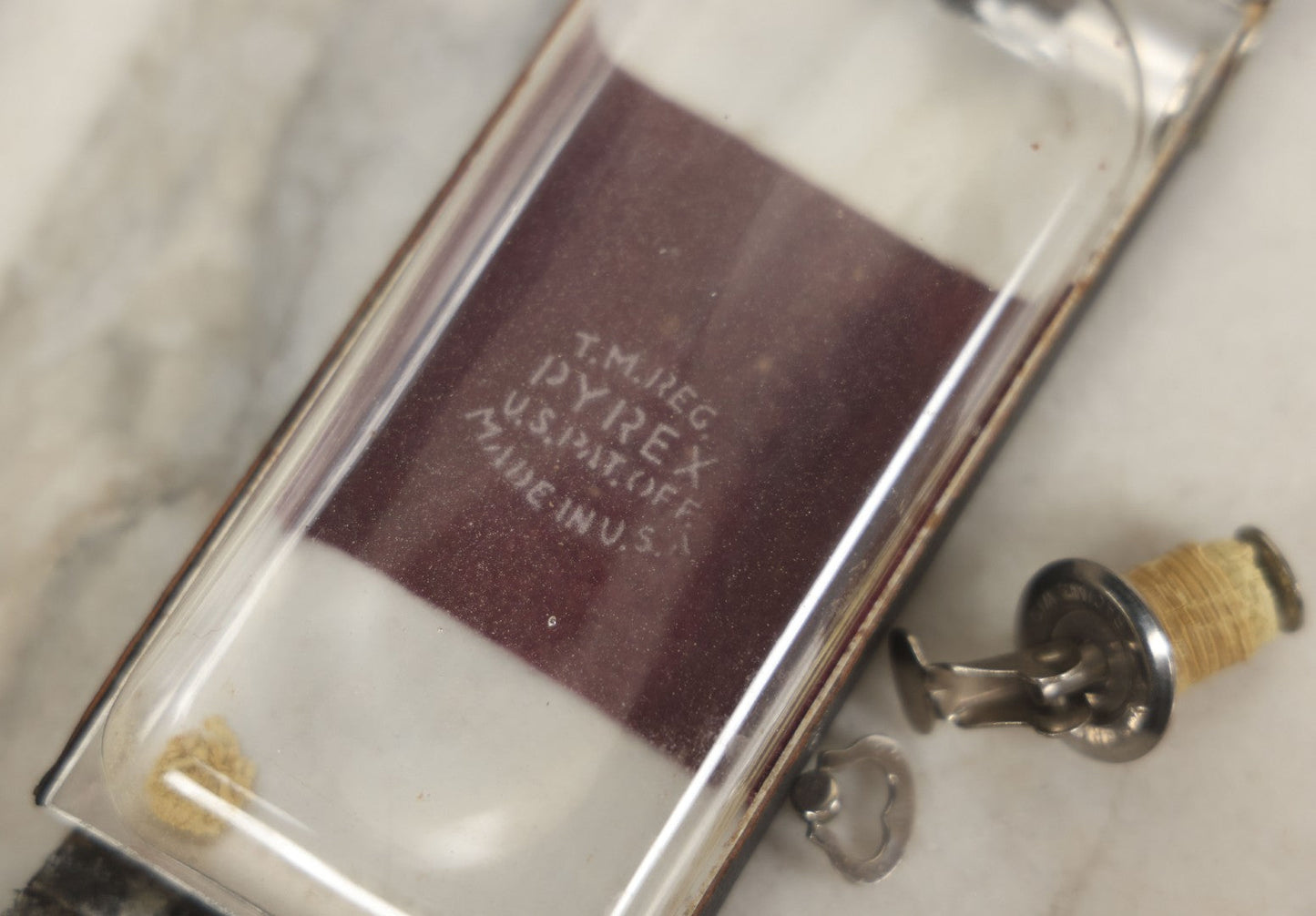 Lot 085 - Vintage Drinking Flask Disguised As Antique Folding Camera With Internal Pyrex Glass Flask, Note Missing Screw And Worn Stopper