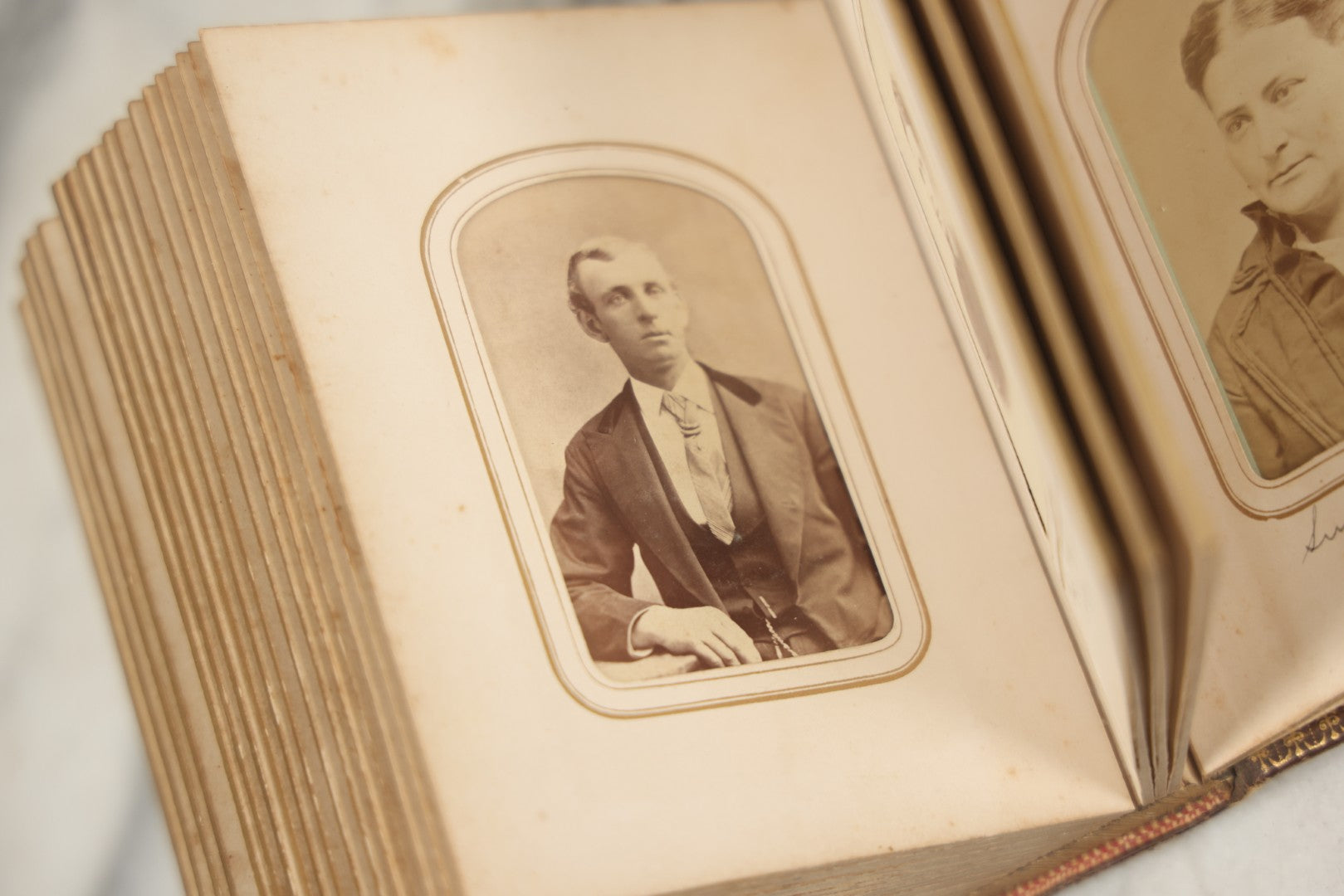 Lot 086 - Antique Family Photo Album With 32 Carte De Visite C.D.V. Photographs And 3 Tintypes, Mostly Of The Clingman Family, Including Photo Of Thomas Clingman, Mortally Wounded At The Battle Of Shiloh, Album By J.B. Lippincott & Co., Philadelphia