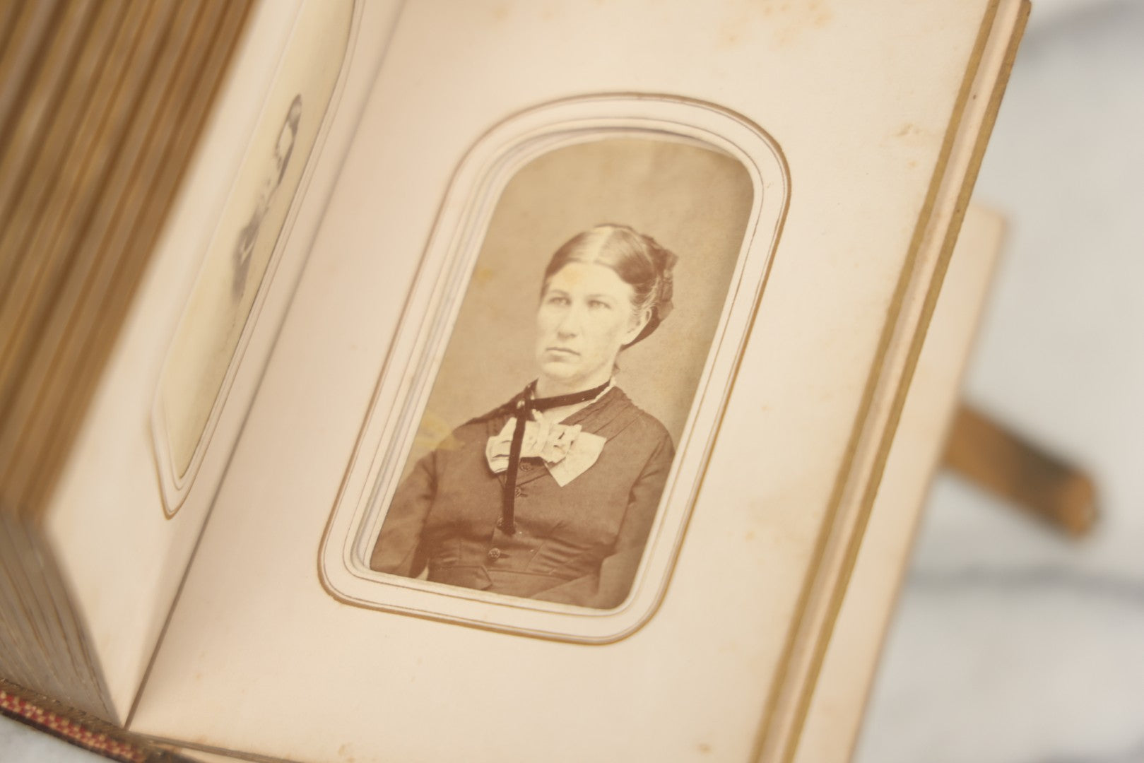 Lot 086 - Antique Family Photo Album With 32 Carte De Visite C.D.V. Photographs And 3 Tintypes, Mostly Of The Clingman Family, Including Photo Of Thomas Clingman, Mortally Wounded At The Battle Of Shiloh, Album By J.B. Lippincott & Co., Philadelphia
