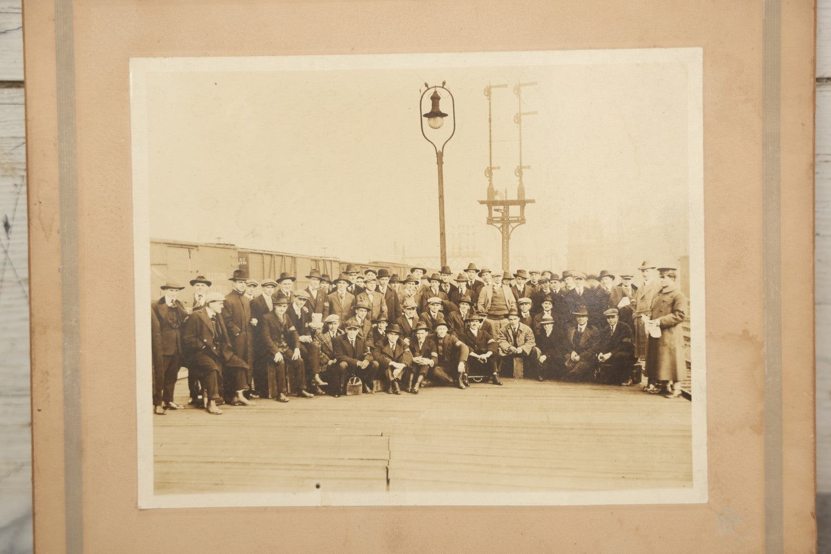 Lot 092 - Antique Boarded Photograph Of Group Of Men In Suits And Hats Posing In Front Of An Illinois Central Railroad Train, Note Warped