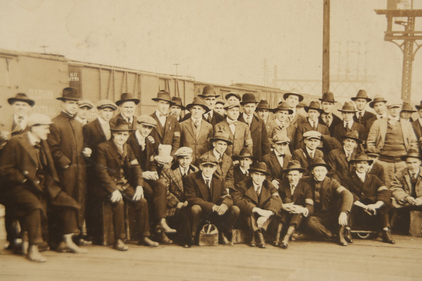 Lot 092 - Antique Boarded Photograph Of Group Of Men In Suits And Hats Posing In Front Of An Illinois Central Railroad Train, Note Warped