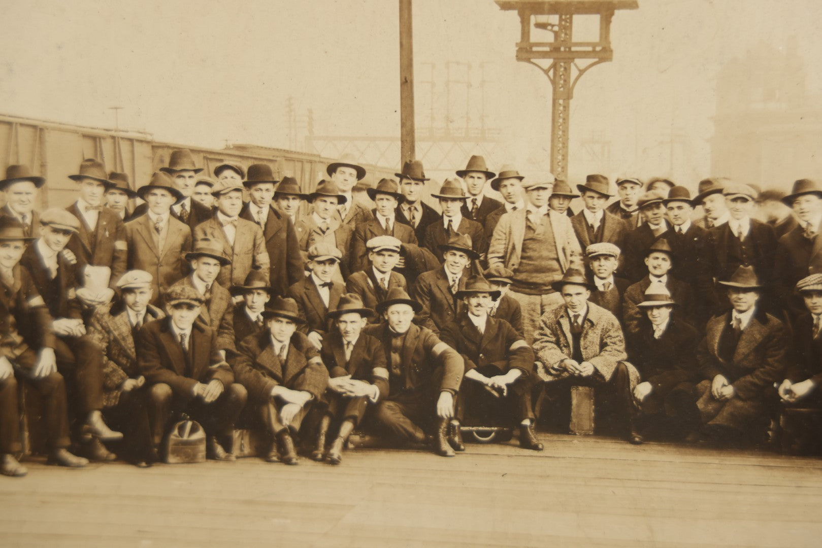 Lot 092 - Antique Boarded Photograph Of Group Of Men In Suits And Hats Posing In Front Of An Illinois Central Railroad Train, Note Warped