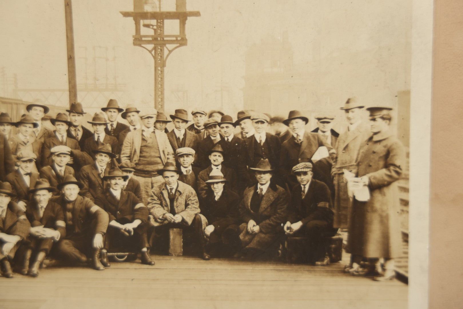Lot 092 - Antique Boarded Photograph Of Group Of Men In Suits And Hats Posing In Front Of An Illinois Central Railroad Train, Note Warped