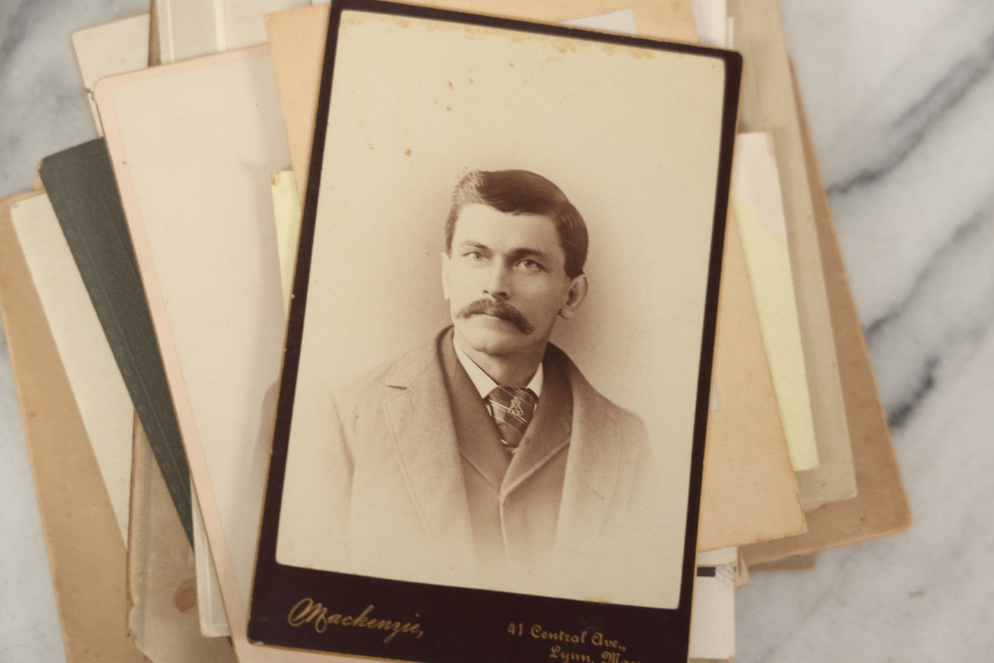 Lot 095 - Grouping Of 22 Antique Cabinet Card And Boarded Photographs, Mostly Portraits Of Men, Women, And Children, Including Two Views Of Houses
