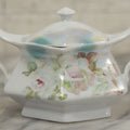 Lot 101 - Antique German Lusterware Porcelain Hexagon Sugar Bowl With Flower Decoration, Upturned Geometric Handles, With Lid And Provenance Note