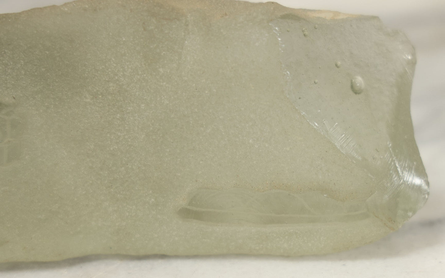 Lot 102 - Vintage Frosted Glass Sculptural Piece With Etched Inuit Figure And Sled Scene