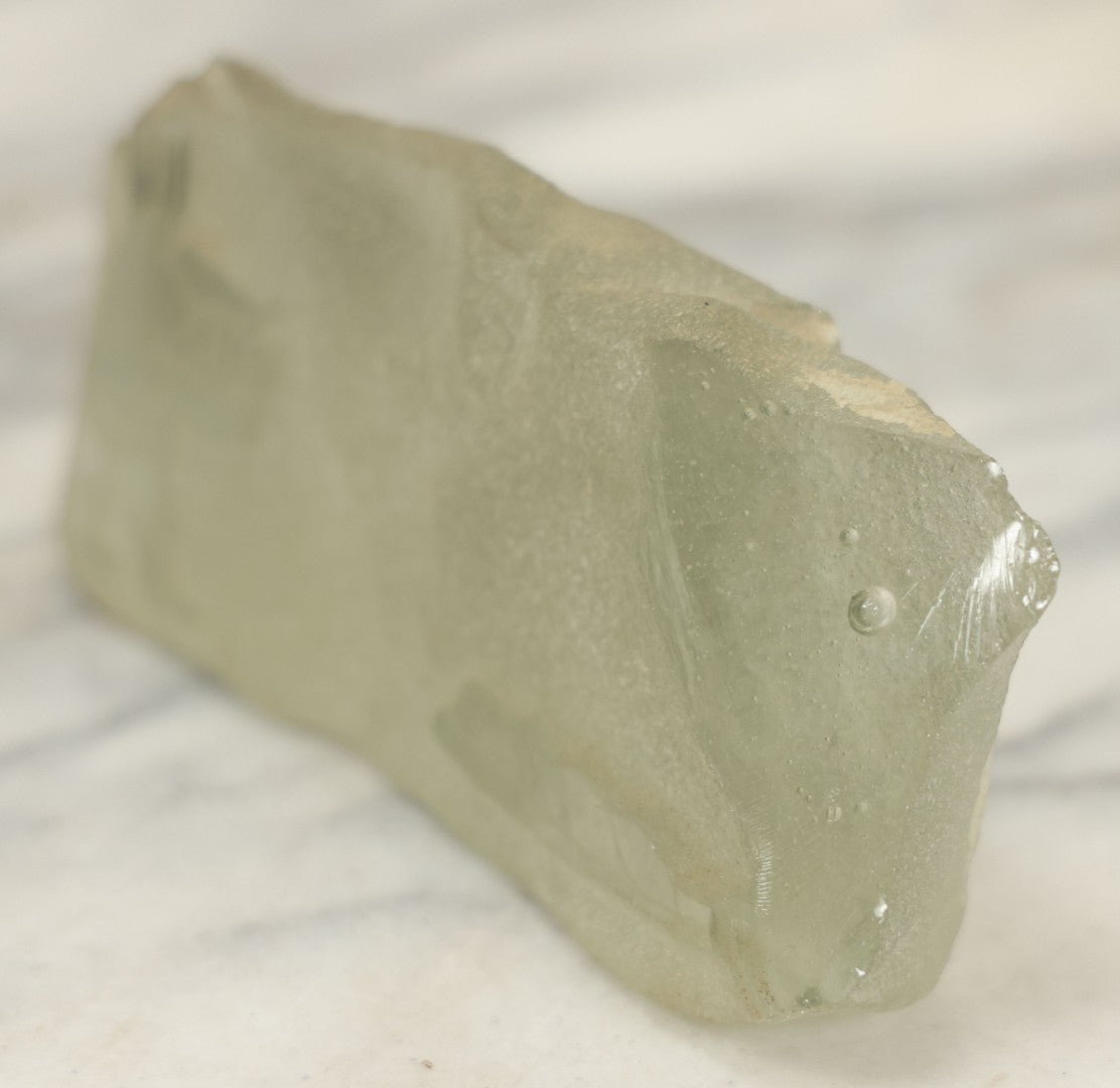 Lot 102 - Vintage Frosted Glass Sculptural Piece With Etched Inuit Figure And Sled Scene