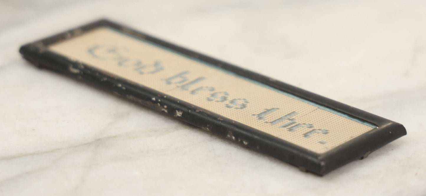 Lot 103 - Antique Small Devotional Punchwork Embroidery “God Bless Thee” In Two-Tone Blue Thread, In Metal Frame Behind Glass, 5-1/2" x 1-3/4"