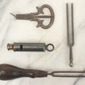 Lot 105 - Grouping Of Four Antique Musical Items Including Two Tuning Forks, Whistle, And Mouth Harp