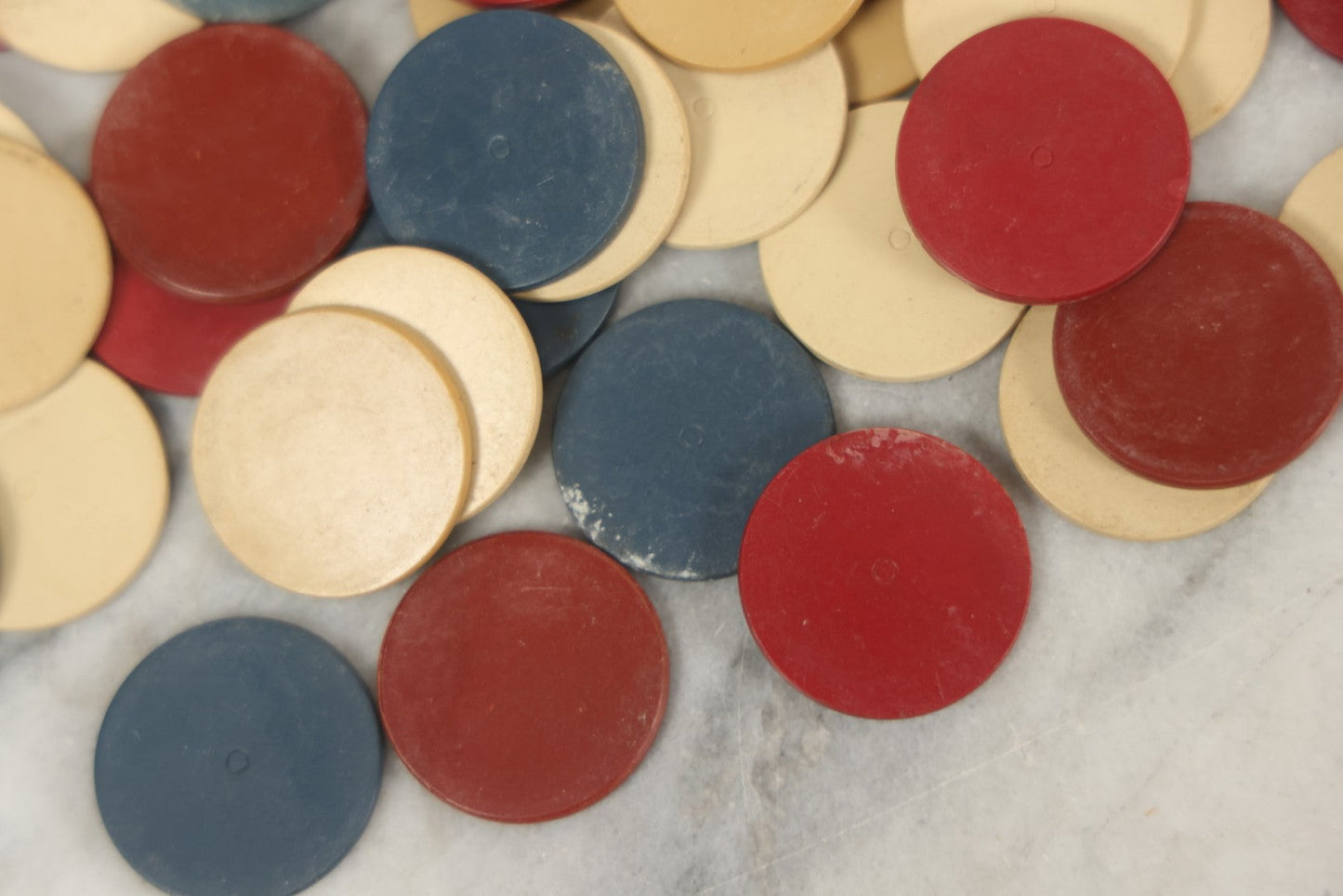 Lot 109 - Grouping Of 75+ Vintage Red, White, And Blue Bakelite Poker Chips