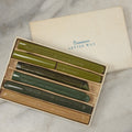 Lot 113 - Box Of Five Dennison's Letter Sealing Wax Sticks In Shades Of Green, Lightly Used, One Broken In Half