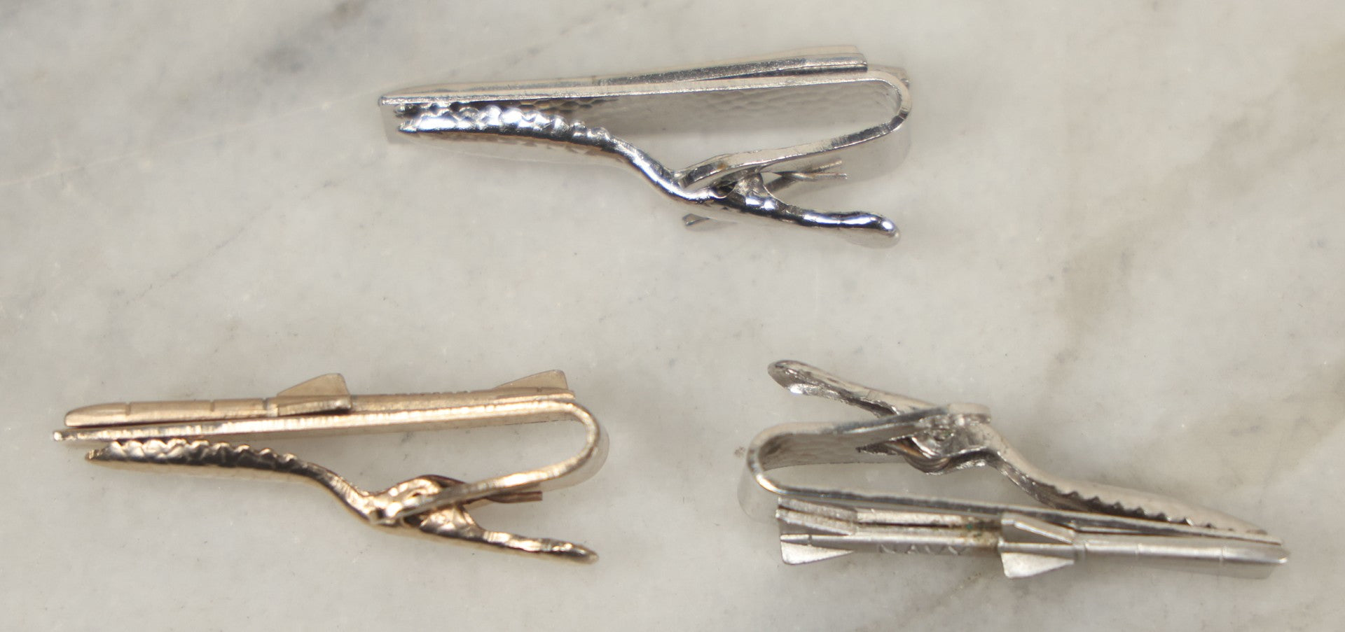 Lot 120 - Grouping Of Three Vintage Occupational Tie Bars With Missile Motifs, Two Marked Navy And One Marked Hawk