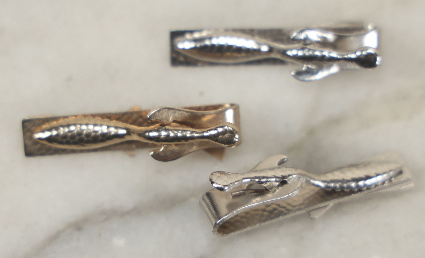 Lot 120 - Grouping Of Three Vintage Occupational Tie Bars With Missile Motifs, Two Marked Navy And One Marked Hawk