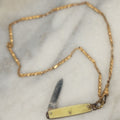 Lot 124 - Vintage Miniature Pocket Knife Marked “Made In U.S.A.” On Wrist Chain Marked “Radio”