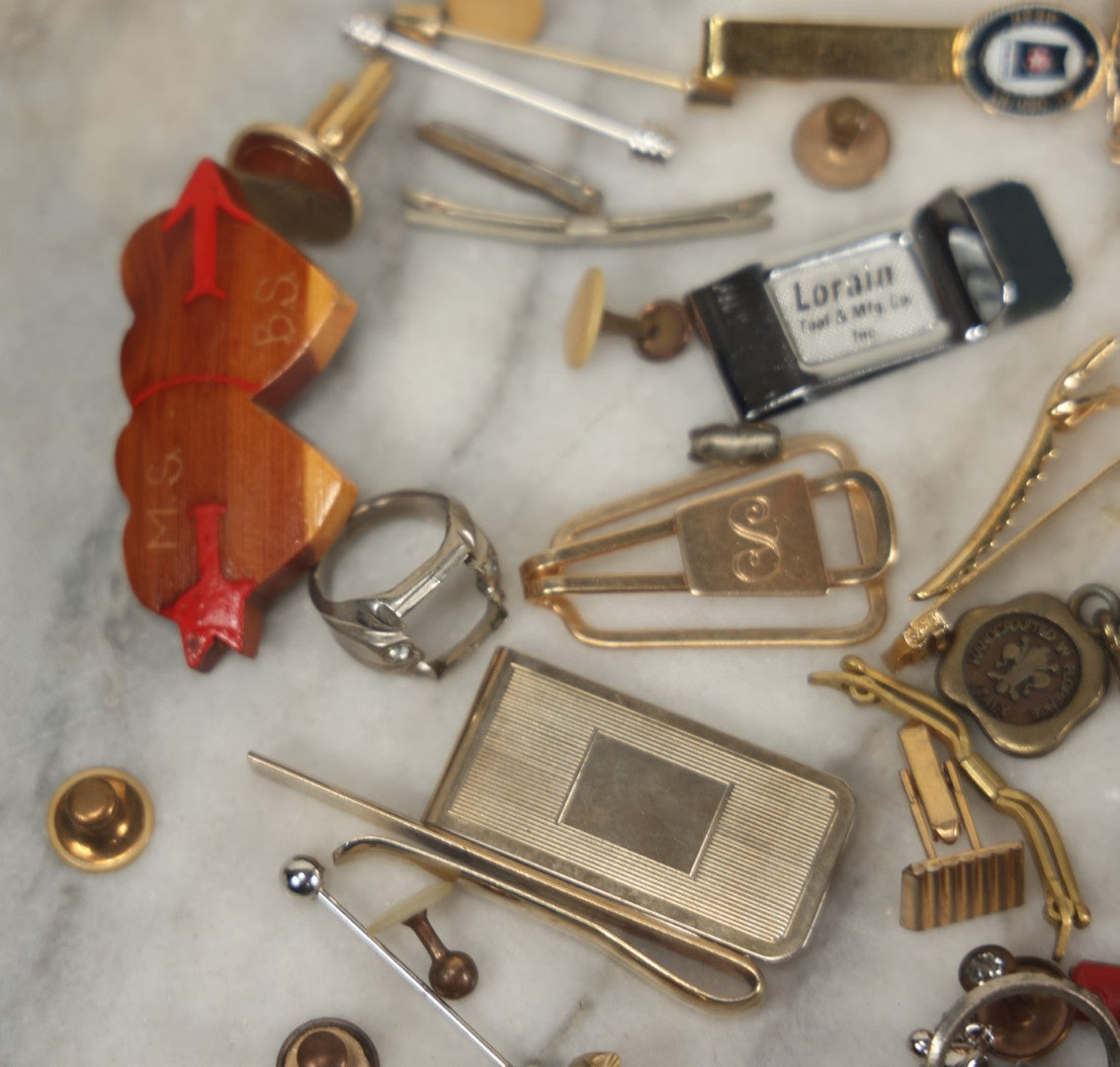 Lot 125 - Grouping Of 10+ Vintage Junk Drawer Items Including Jewelry, Pins, Tie Bars, And Wooden Bunny Chicago 1943 Pin