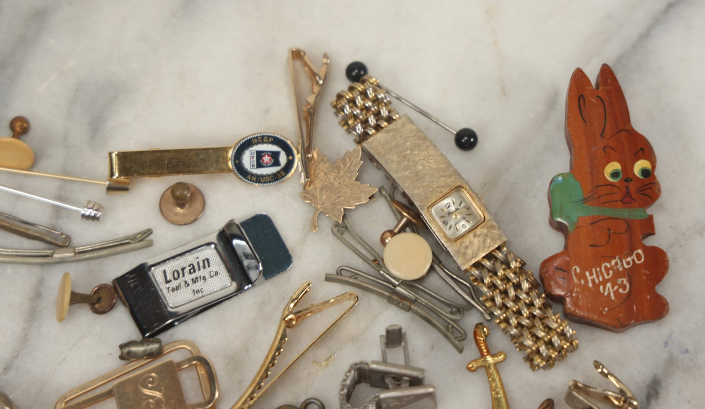 Lot 125 - Grouping Of 10+ Vintage Junk Drawer Items Including Jewelry, Pins, Tie Bars, And Wooden Bunny Chicago 1943 Pin
