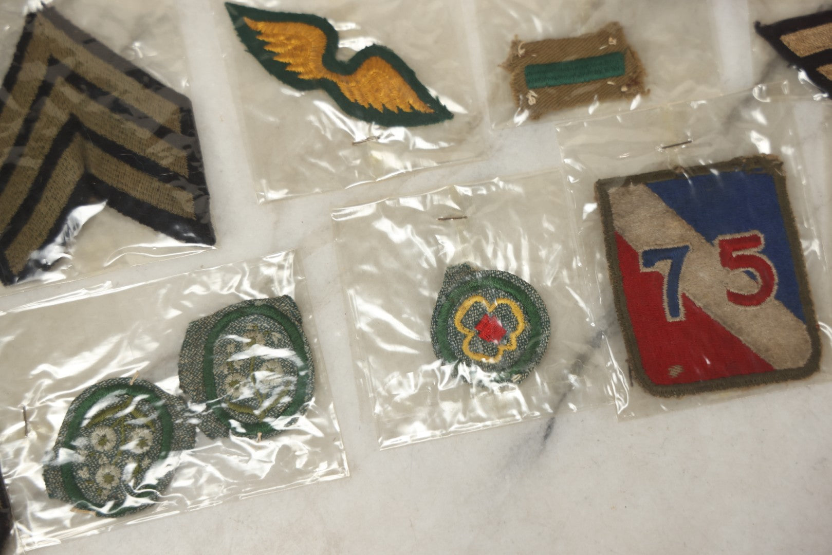 Lot 127 - Grouping Of 15+ Vintage Embroidered Patches Including Military, Girl Scouts, And More