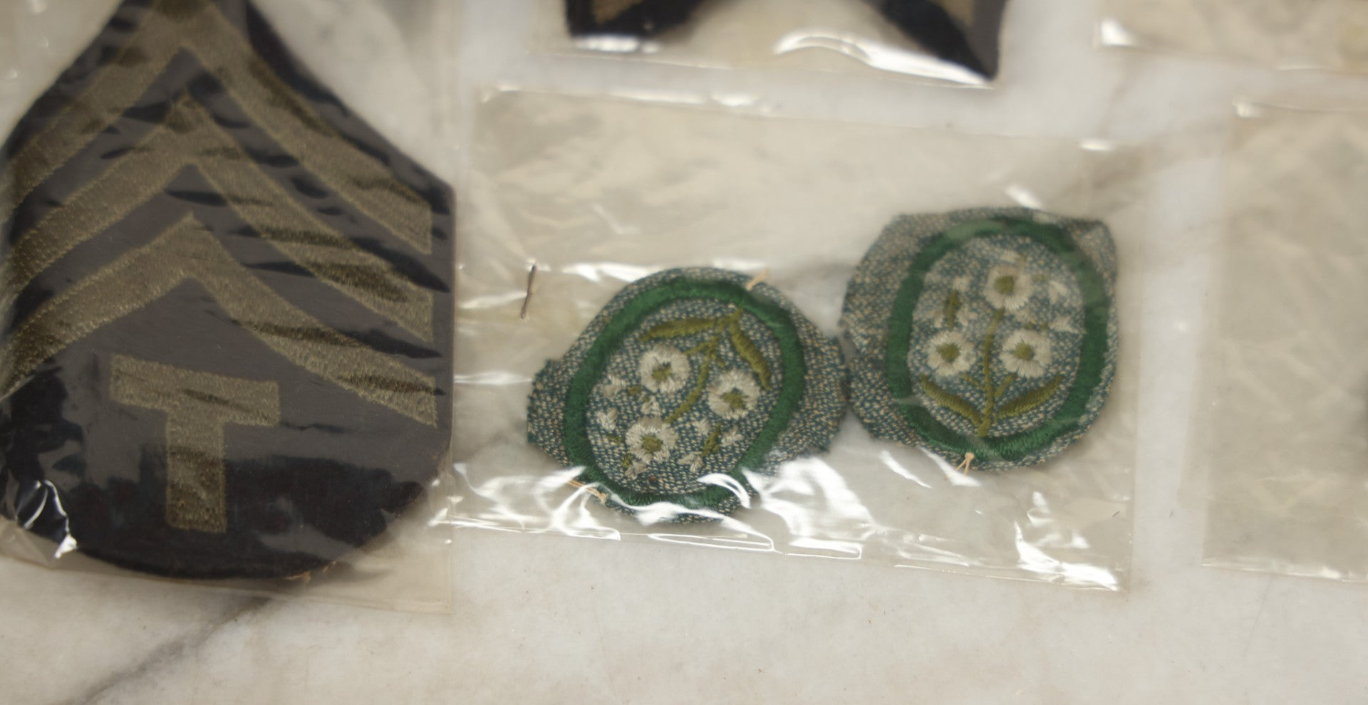 Lot 127 - Grouping Of 15+ Vintage Embroidered Patches Including Military, Girl Scouts, And More