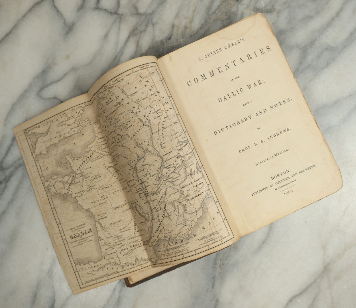 Lot 141 - "Commentaries On The Gallic War" Antique Latin Book By Julius Caesar, With Dictionary And Notes In English By Prof. E.A. Andrews, Published By Crocker And Brewster, Boston, 1860, With Fold-Out Map Of France (Galliae), Embossed Design On Covers