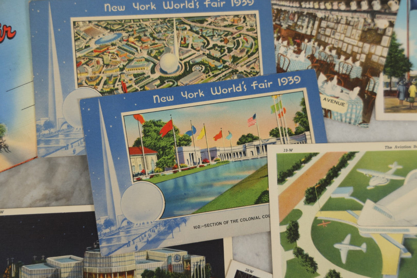 Lot 161 - Grouping Of Vintage 1939 New York World's Fair And N.Y.C. Themed Postcards, Including 11 Single Postcards And Licensed Souvenir Folder, Copyright 1939
