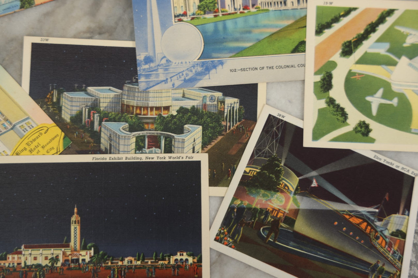 Lot 161 - Grouping Of Vintage 1939 New York World's Fair And N.Y.C. Themed Postcards, Including 11 Single Postcards And Licensed Souvenir Folder, Copyright 1939