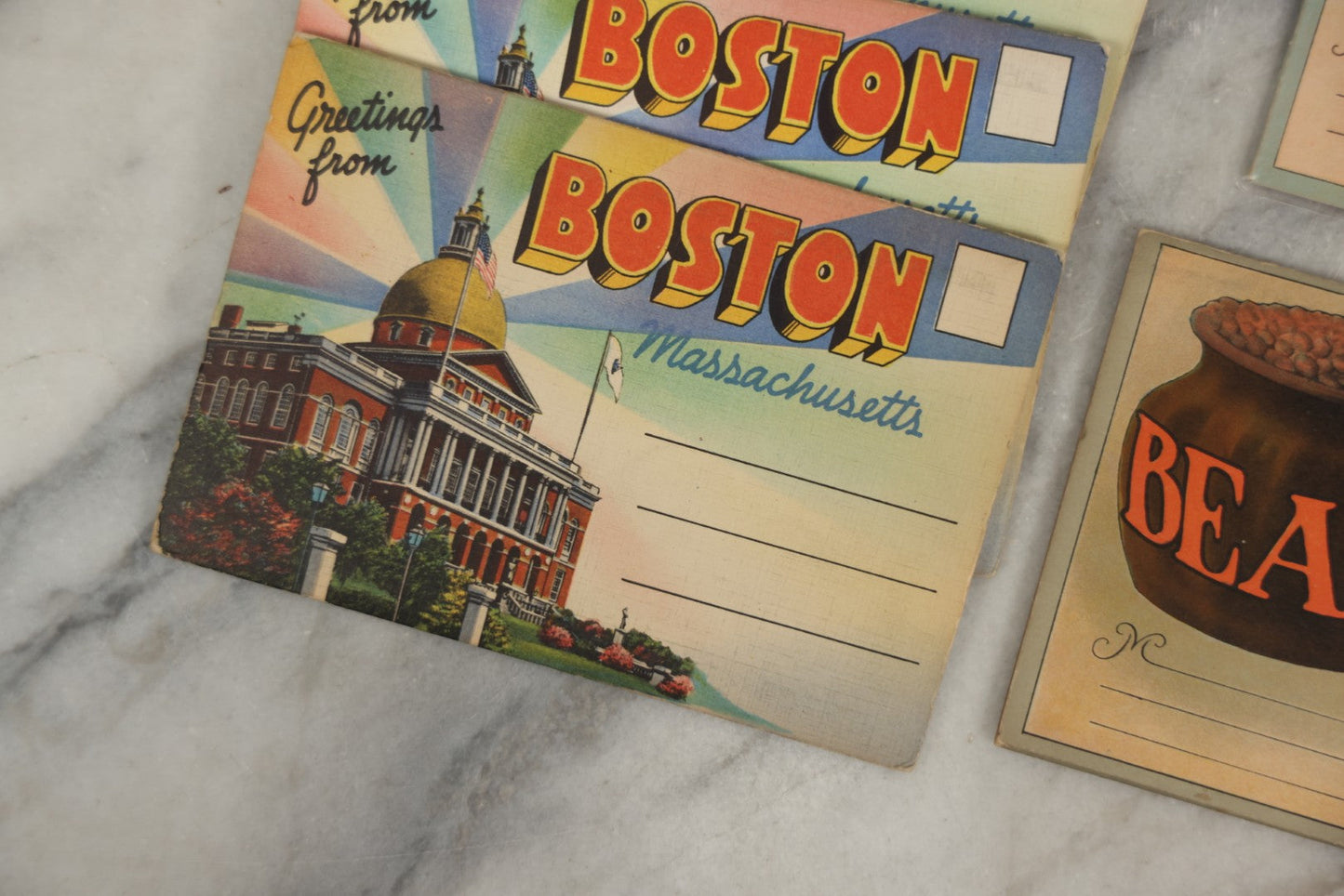 Lot 163 - Grouping Of Six Vintage Boston Themed Souvenir Folders, Including Small Souvenir Folder Featuring Boston Baked Beans And Four Of "Greetings From Boston" Folder
