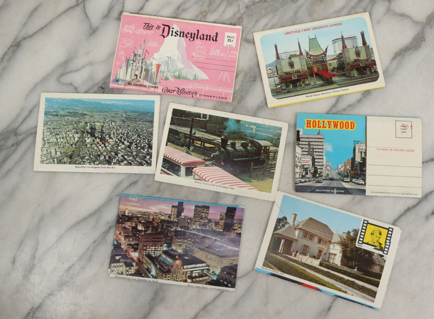 Lot 167 - Grouping Of Seven Vintage California Themed Souvenir Folders, Including Disneyland, The Home Of Doris Day, Hollywood, Los Angeles, And Universal Studios
