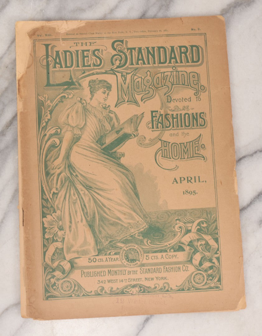 Lot 081 - "The Ladies Standard Magazine Devoted To Fashions And The Home" Antique Magazine, April 1895 Edition, Vol. XIII, Published By The Standard Fashion Co., New York, With Victorian Fashion Designs