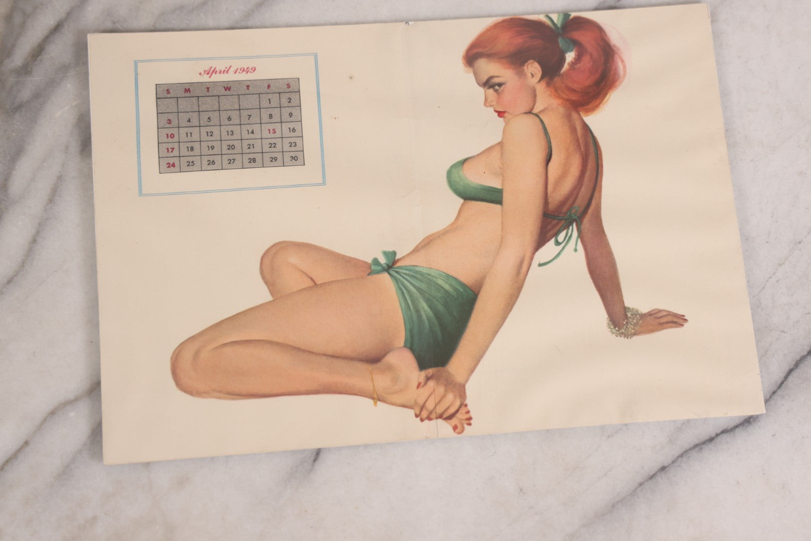Lot 087 - Grouping Of Three Vintage Pin-Up Calendar Pages Including April 1949, November 1949, And October 1950, Illustrated With Risqué Women