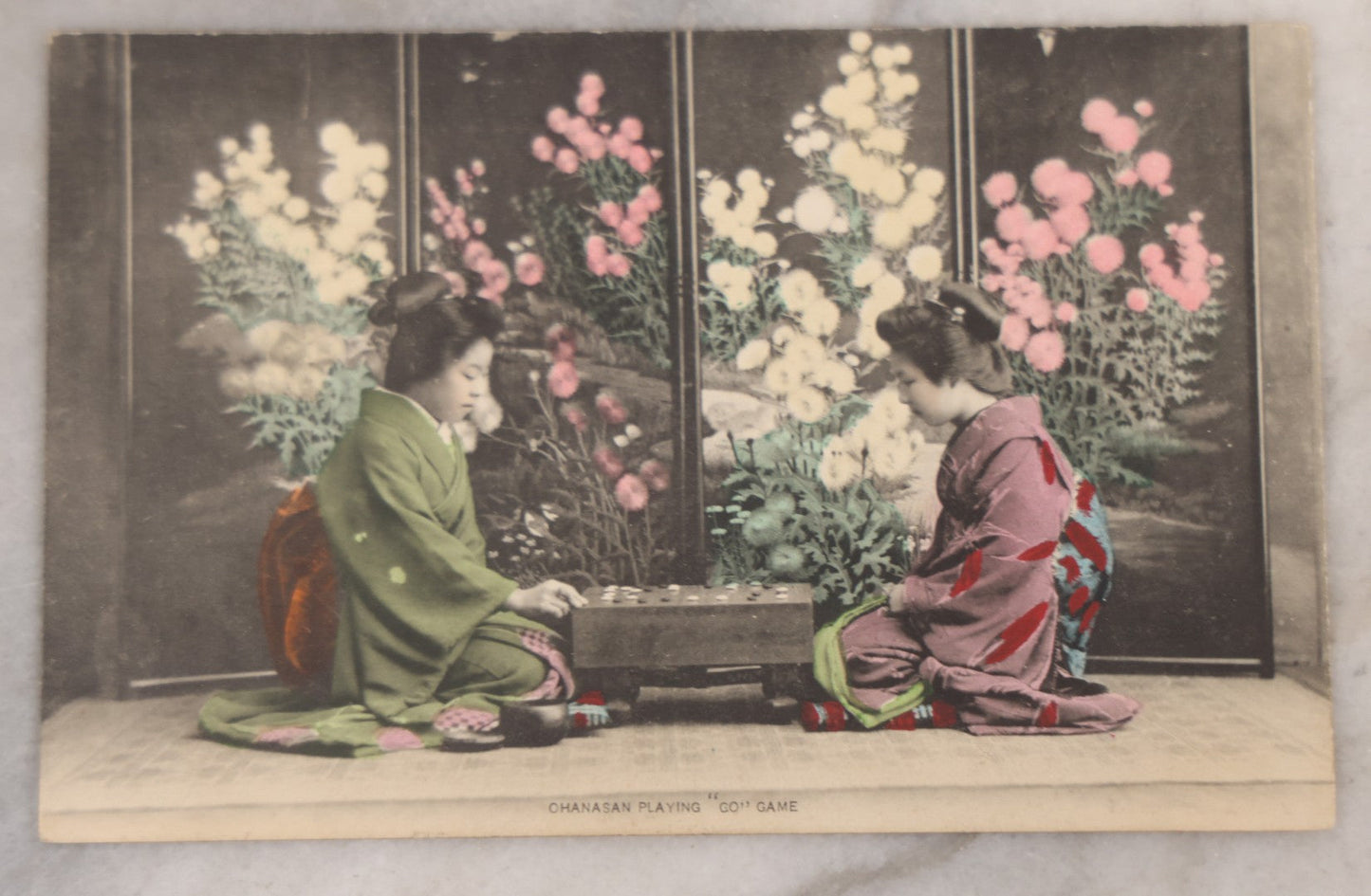 Lot 094 - Grouping Of Six Antique Hand-Colored Postcards Of Life In Japan, Including Women Playing A Game And Cherry Blossoms At Uyeno Park, Tokyo, Made In Japan