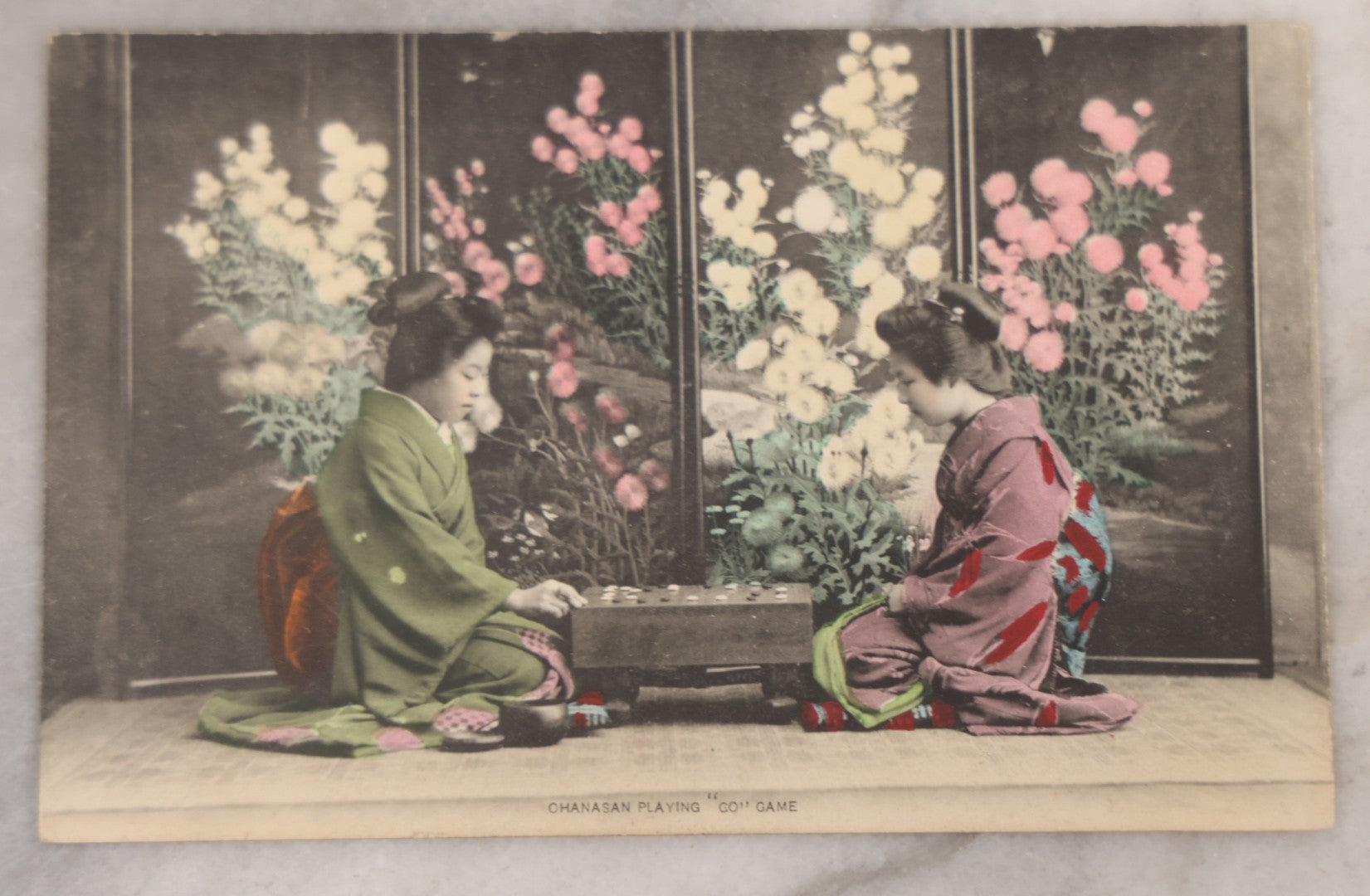 Lot 094 - Grouping Of Six Antique Hand-Colored Postcards Of Life In Japan, Including Women Playing A Game And Cherry Blossoms At Uyeno Park, Tokyo, Made In Japan