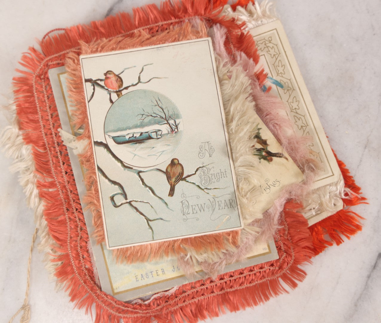Lot 096 - Grouping Of Eight Antique Holiday Greeting Cards With Fabric Fringe, Including New Year's And Easter Lithograph Cards