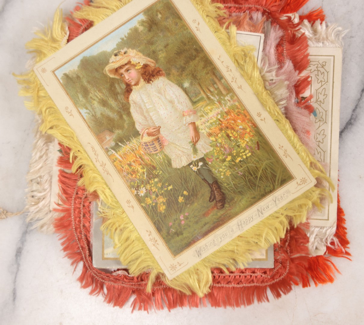 Lot 096 - Grouping Of Eight Antique Holiday Greeting Cards With Fabric Fringe, Including New Year's And Easter Lithograph Cards