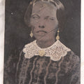Lot 103 - Antique Tintype Photograph Of Woman With A Toothy, Stoic Expression, Hand-Painted Details, Slightly Smaller Than Half Plate