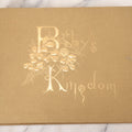 Lot 131 - "Baby's Kingdom" Antique Illustrated Baby Book With Gilt Embossed Clovers And Lettering On Cover, Gilt Foredge, Some Records Of Baby Harold Schenck, Born July 1892, With Calligraphy And Memos From Parents On 10+ Pages