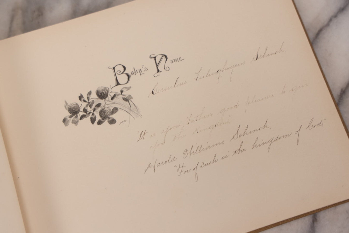 Lot 131 - "Baby's Kingdom" Antique Illustrated Baby Book With Gilt Embossed Clovers And Lettering On Cover, Gilt Foredge, Some Records Of Baby Harold Schenck, Born July 1892, With Calligraphy And Memos From Parents On 10+ Pages