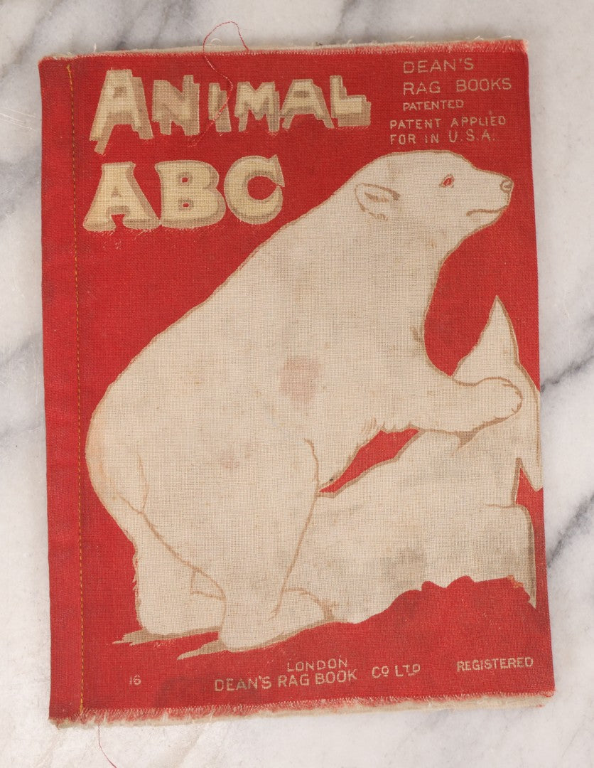 Lot 137 - Grouping Of Four Antique Linen Rag Books Including "Animal A.B.C." And "Toddle's A.B.C.," Published By Dean's Rag Book Co. Ltd., London, And "Ten Little Tin Soldiers"  And "Mother Goose," Published By The Saalfield Pub. Co., New York, 1910