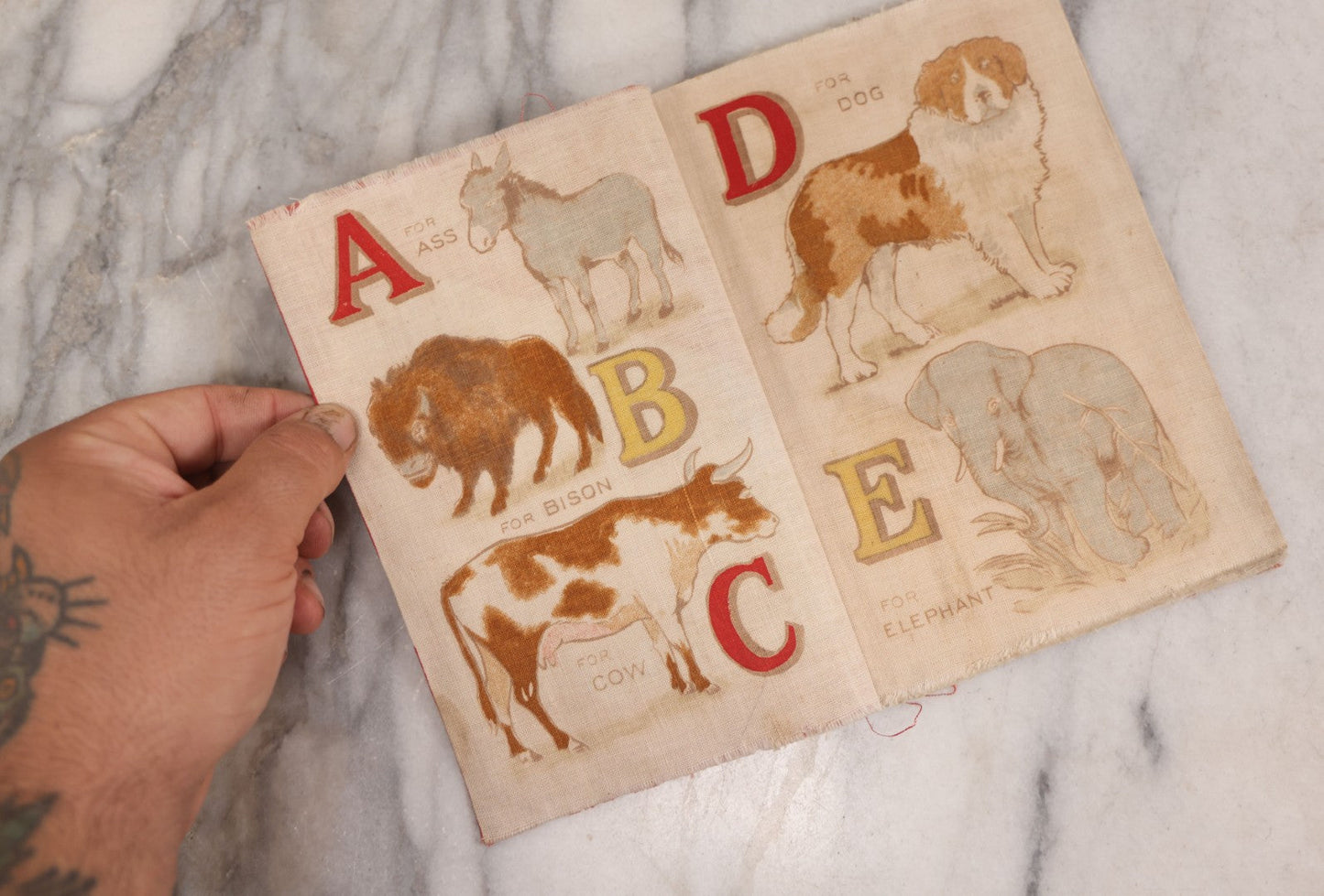 Lot 137 - Grouping Of Four Antique Linen Rag Books Including "Animal A.B.C." And "Toddle's A.B.C.," Published By Dean's Rag Book Co. Ltd., London, And "Ten Little Tin Soldiers"  And "Mother Goose," Published By The Saalfield Pub. Co., New York, 1910