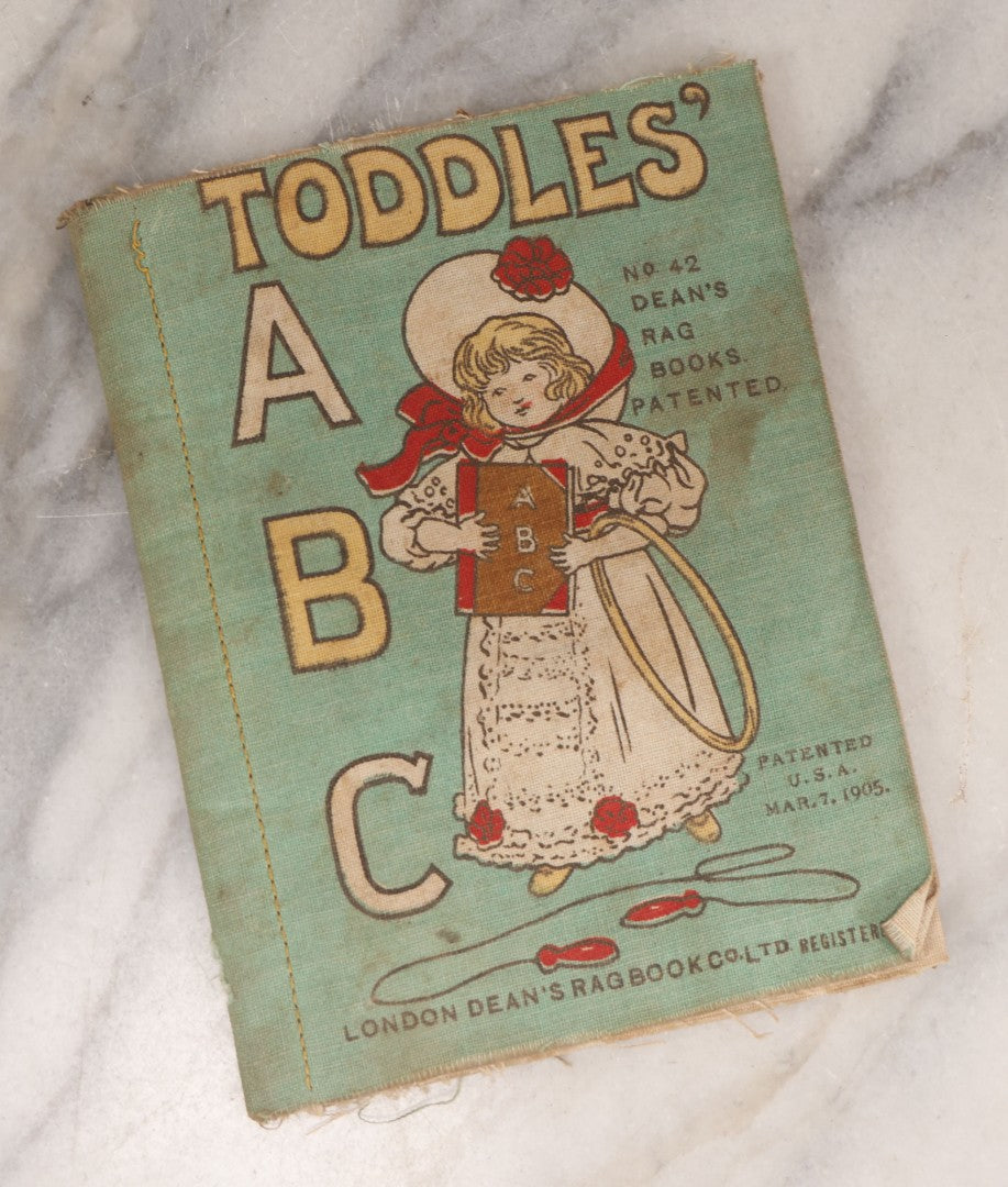 Lot 137 - Grouping Of Four Antique Linen Rag Books Including "Animal A.B.C." And "Toddle's A.B.C.," Published By Dean's Rag Book Co. Ltd., London, And "Ten Little Tin Soldiers"  And "Mother Goose," Published By The Saalfield Pub. Co., New York, 1910