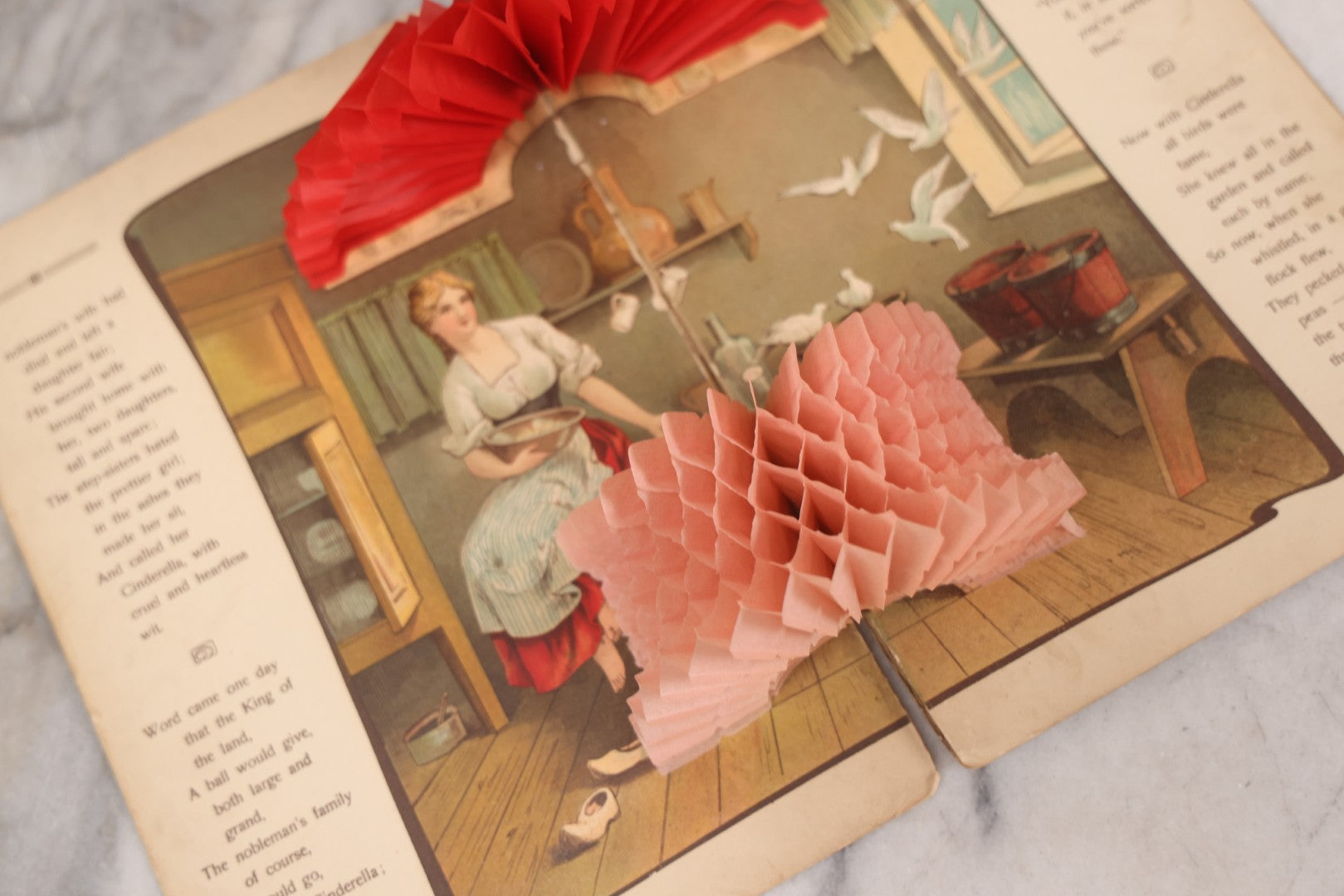 Lot 141 - Pair Of Antique German Pop-Up Fairytale Books Including "Hansel And Grethel" And "Cinderella," Triumph Editions, Published By B. Wilmsen, Philadelphia, Printed In Germany With Accordion Crepe Paper Pop-Ups, Circa 1895