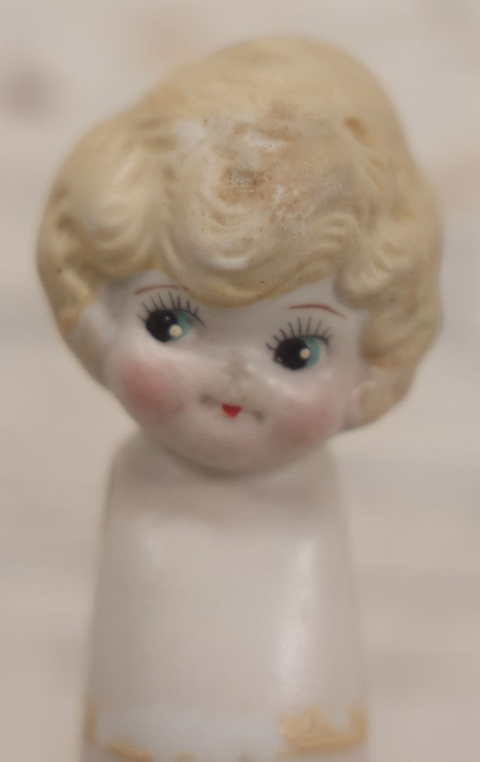 Lot 150 - Vintage Bisque Blond Kewpie Doll, Marked Made In Japan, Missing Arms And Clothes, 5" H