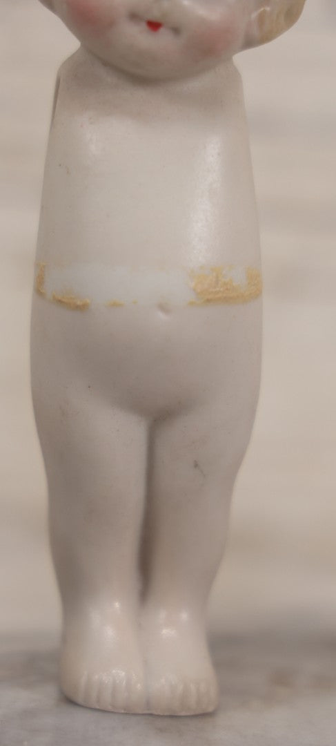 Lot 150 - Vintage Bisque Blond Kewpie Doll, Marked Made In Japan, Missing Arms And Clothes, 5" H