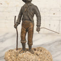 Lot 005 - Antique Bronze Figural Sculpture Of Young Fishing Boy With Walking Stick, Mounted On Natural Stone Base, Circa Late 19th Century, 8-1/2" H