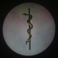 Lot 028 - Antique Hand Colored Odd Fellows I.O.O.F. Magic Lantern Glass Slide With Wood Holder, No. 12 The Serpent, Manufactured By The Henderson-Ames Co., Kalamazoo, Michigan