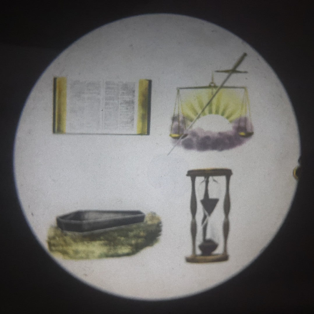 Lot 039 - Antique Hand Colored Odd Fellows I.O.O.F. Magic Lantern Glass Slide With Wood Holder, Third Degree, Depicting The Bible, Scales, Hour Glass, And Coffin, Manufactured By The Henderson-Ames Co., Kalamazoo, Michigan